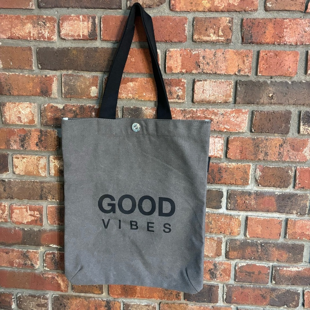 woman’s good vibes canvas tote bag brown